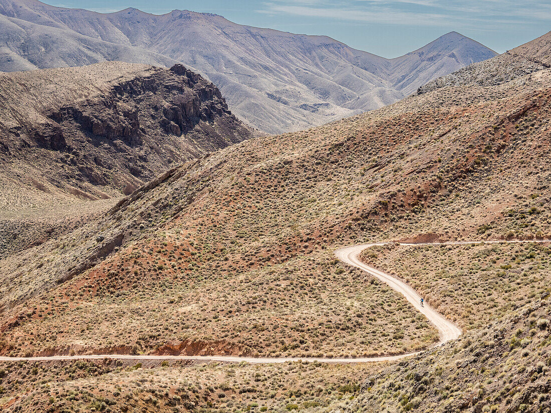 A mountain biker in Titus Canyon in Death Valley National Park, California, United States of America, North America