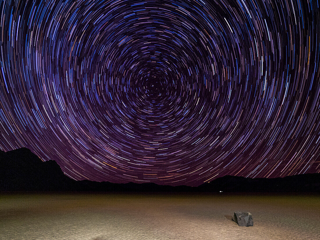 Night photo of stars, the Racetrack, a playa or dried up lakebed, in Death Valley National Park, California, United States of America, North America
