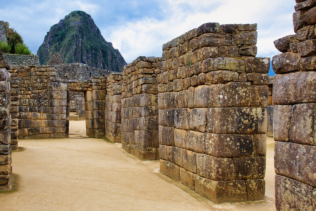 Machu Picchu, UNESCO World Heritage Site, gate in the ruined city of the Incas with the Mount Huayana Picchu, Andes Cordillera, Urubamba province, Cusco, Peru, South America