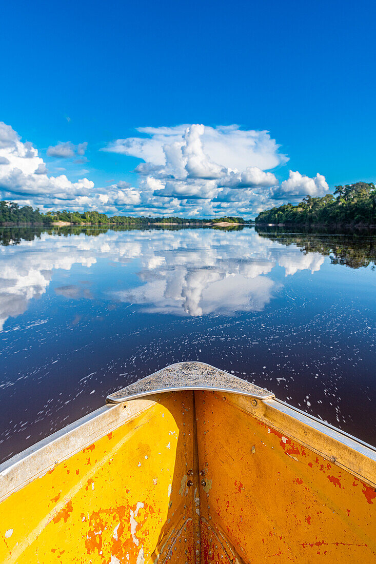 Clouds reflecting in the Rio Negro, southern Venezuela, South America