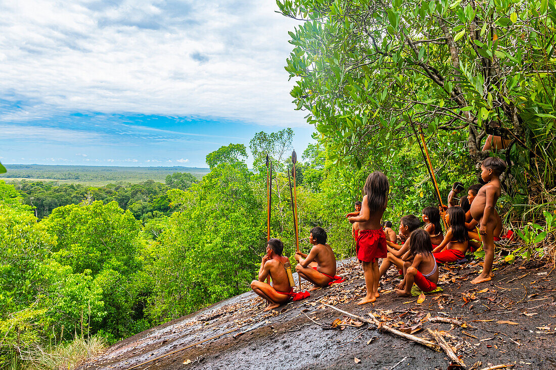 Yanomami tribes men standing in the jungle, southern Venezuela, South America