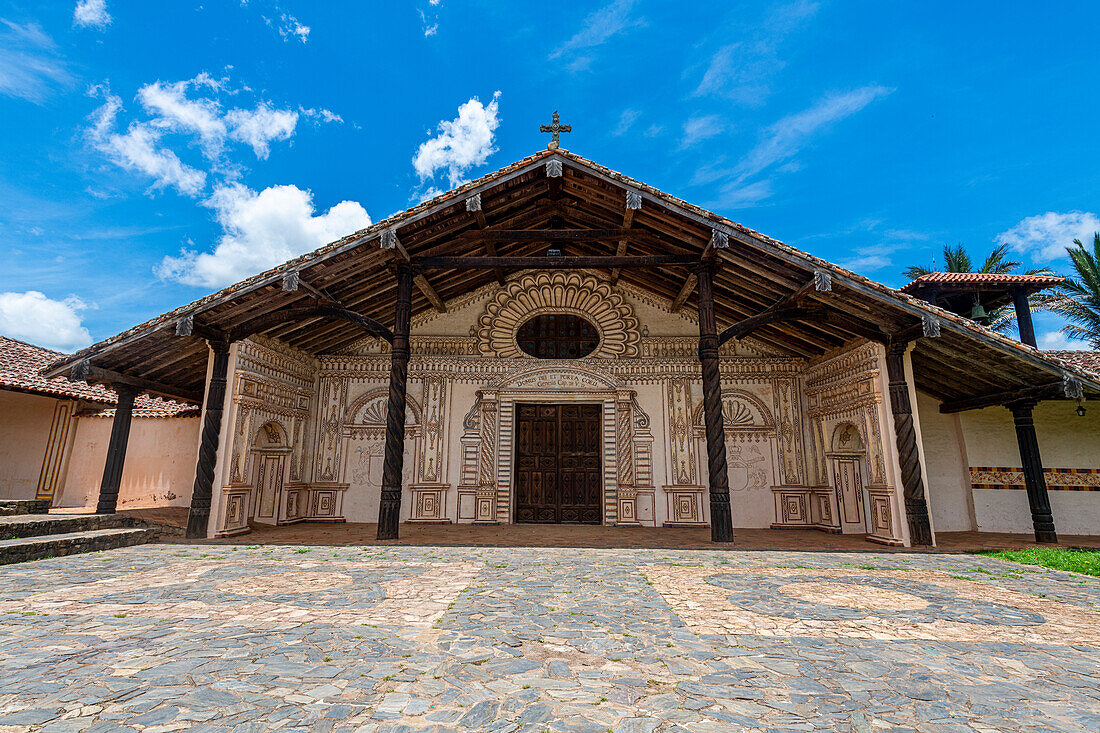 Colourful painted front portal, San Javier Mission, Jesuit Missions of Chiquitos, UNESCO World Heritage Site, Santa Cruz department, Bolivia, South America