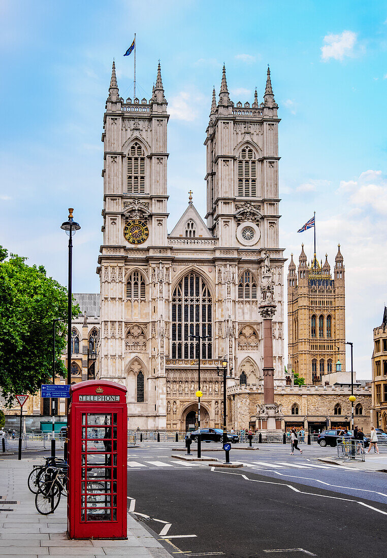 Red Telephone Box and Westminster Abbey, UNESCO World Heritage Site, London, England, United Kingdom, Europe