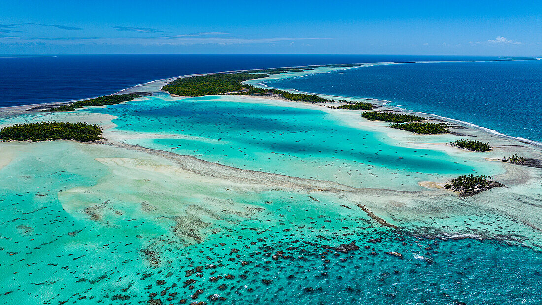 Aerial of the Blue Lagoon, Rangiroa atoll, Tuamotus, French Polynesia, South Pacific, Pacific