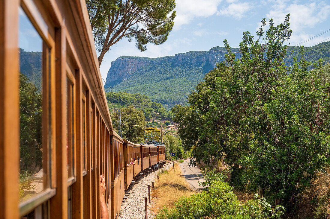Soller train travelling in mountains towards Soller, Majorca, Balearic Islands, Spain, Mediterranean, Europe