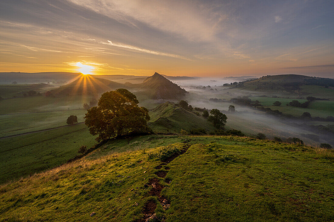 Sunrise at Chrome Hill and Parkhouse hill with low lying cloud in The Peak District, Derbyshire, England, United Kingdom, Europe