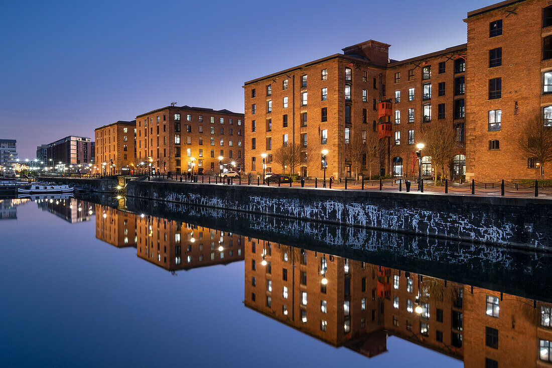 The Albert Dock reflected in Salthouse Dock at night, Liverpool Waterfront, Liverpool, Merseyside, England, United Kingdom, Europe