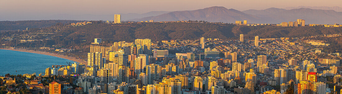 Elevated view of Vina del Mar coastal city at sunset seen from Mirador Pablo Neruda, Vina del Mar, Chile, South America