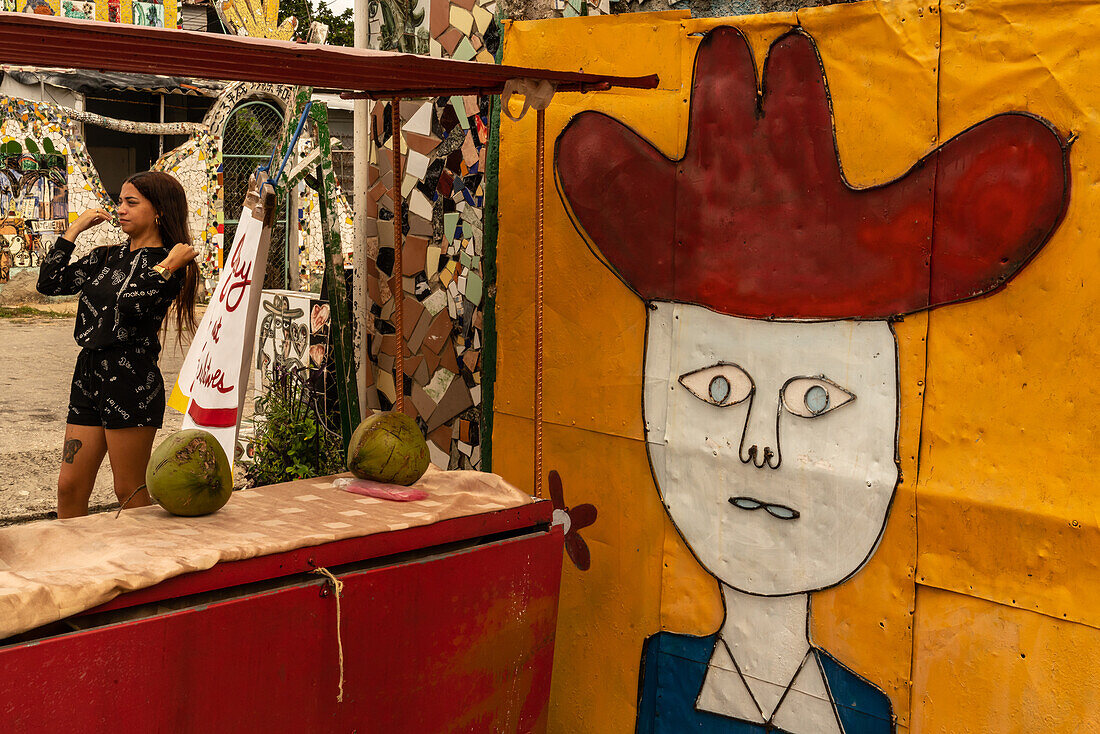 Outside art gallery with young woman in background, Havana, Cuba, West Indies, Caribbean, Central America