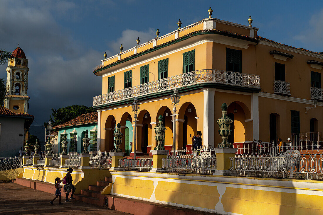 Evening sunlight bathes Palacio Brunet on main square, Trinidad, Cuba, West Indies, Caribbean, Central America