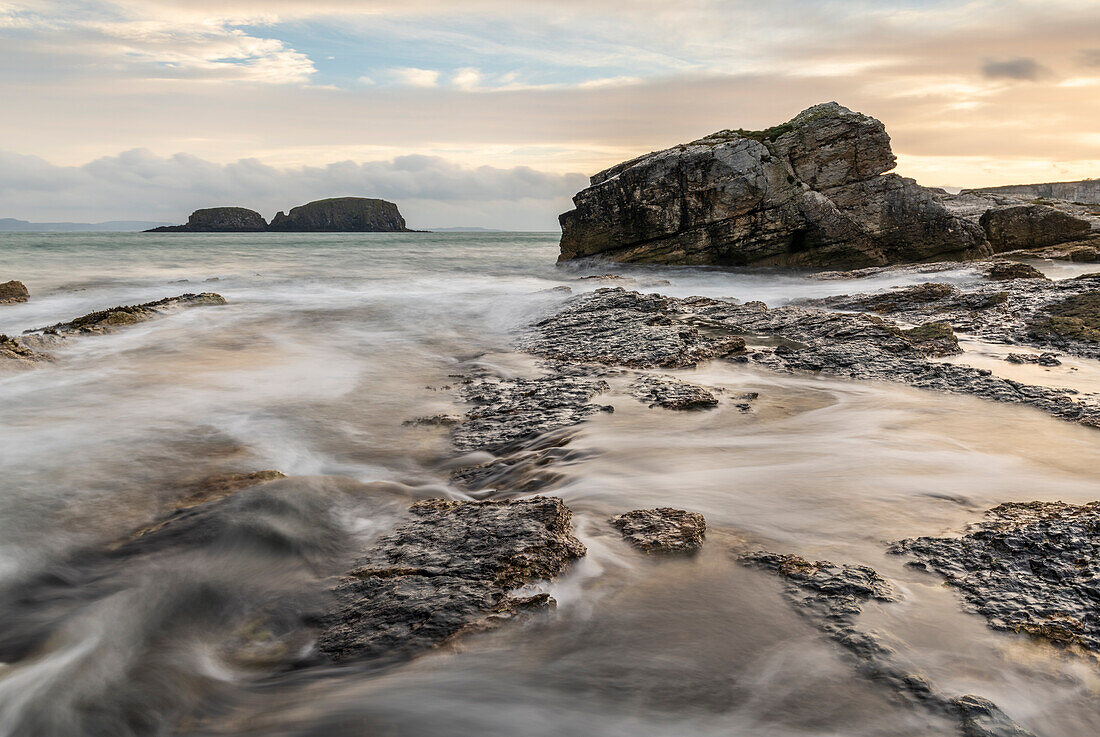 Sunrise at Ballintoy Harbour on the Causeway Coast, County Antrim, Ulster, Northern Ireland, United Kingdom, Europe