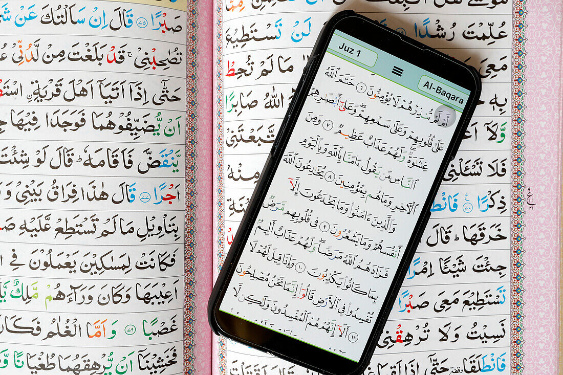 Digital Quran on smartphone and traditional paper Holy Quran, paper and digital Quran, Al-Serkal Mosque, Cambodia, Indochina, Southeast Asia, Asia