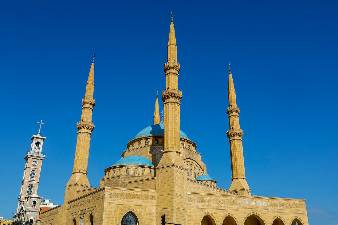 St. George Maronite Cathedral bell tower and Mohammed al-Amine Sunni Mosque, Beirut, Lebanon, Middle East