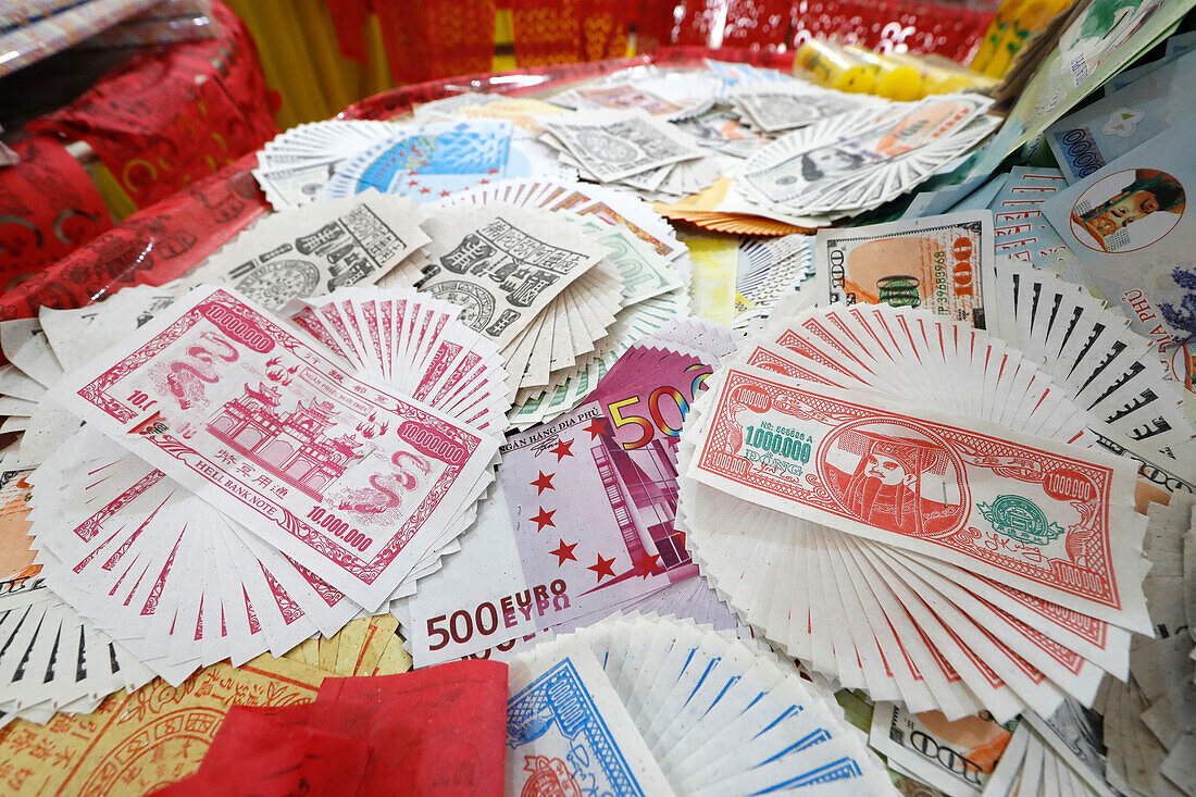 Burning hell bank notes and other forms of joss paper for Buddhist and Taoist ceremony, Phuoc Long Buddhist Temple, Tan Chau, Vietnam, Indochina, Southeast Asia, Asia