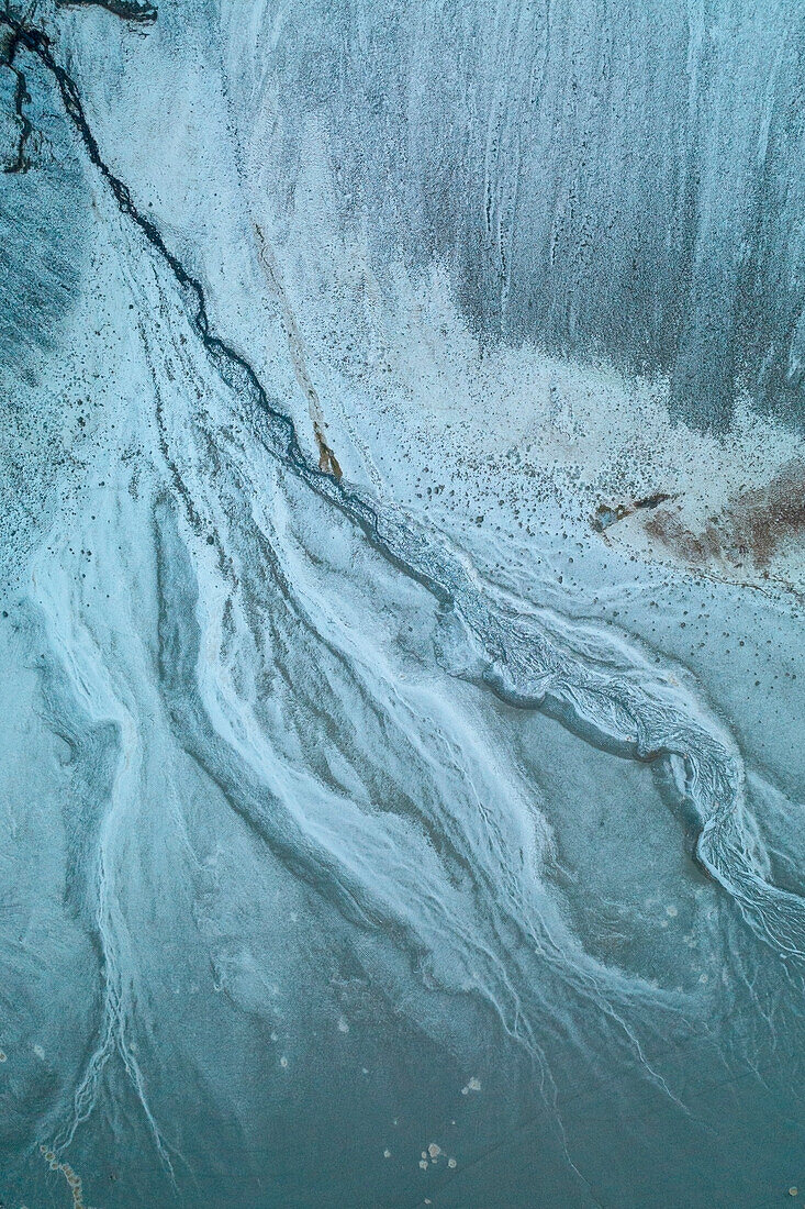 aerial abstract taken by drone of icelandic river during a winter day, Austurland, Iceland, Europe