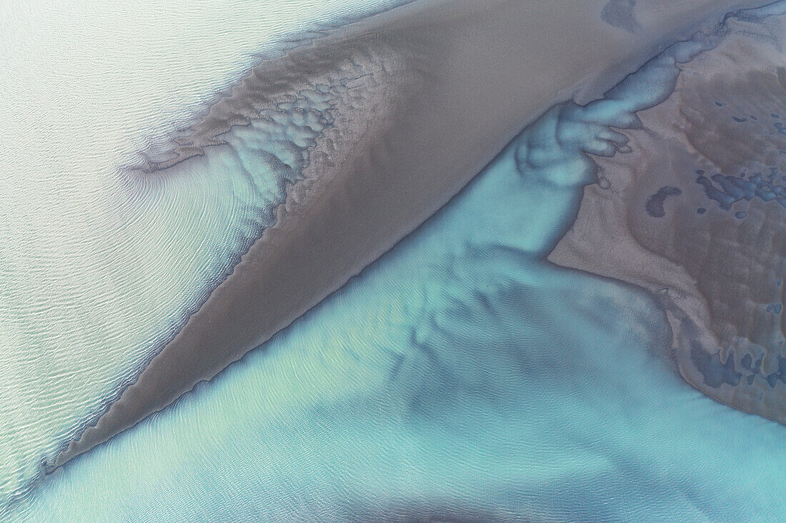 aerial abstract taken by drone of icelandic river during a winter day, Austurland, Iceland, Europe