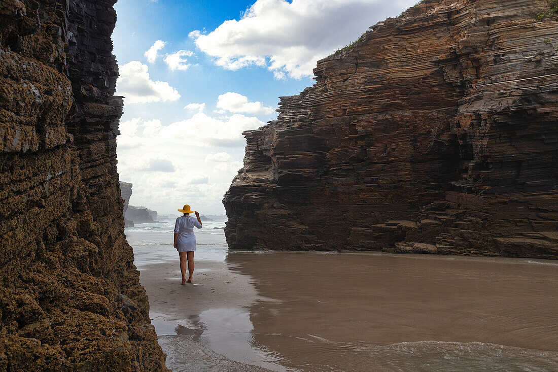 one tourist enjoy the landscape at Praia at Catedrais during a low tide, Galixia, Spain, Europe