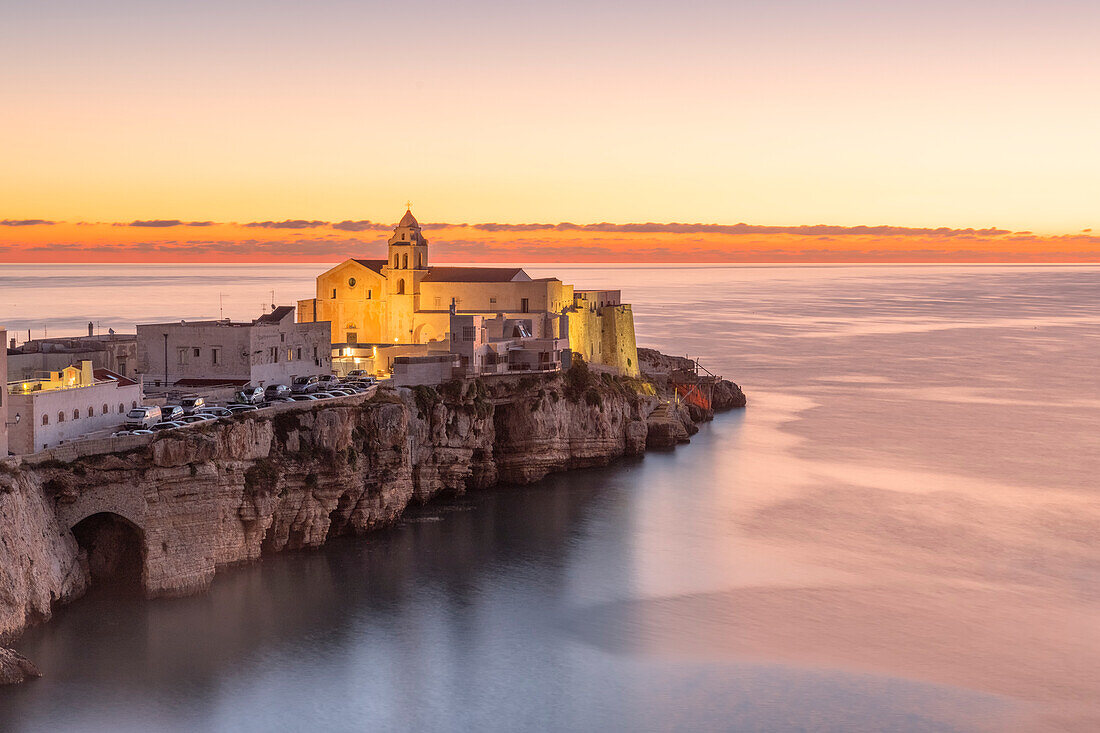 view of the historic center of Vieste, taken during a warm summer sunrise, municipality of Vieste, Foggia province, Apulia district, Italy, Europe