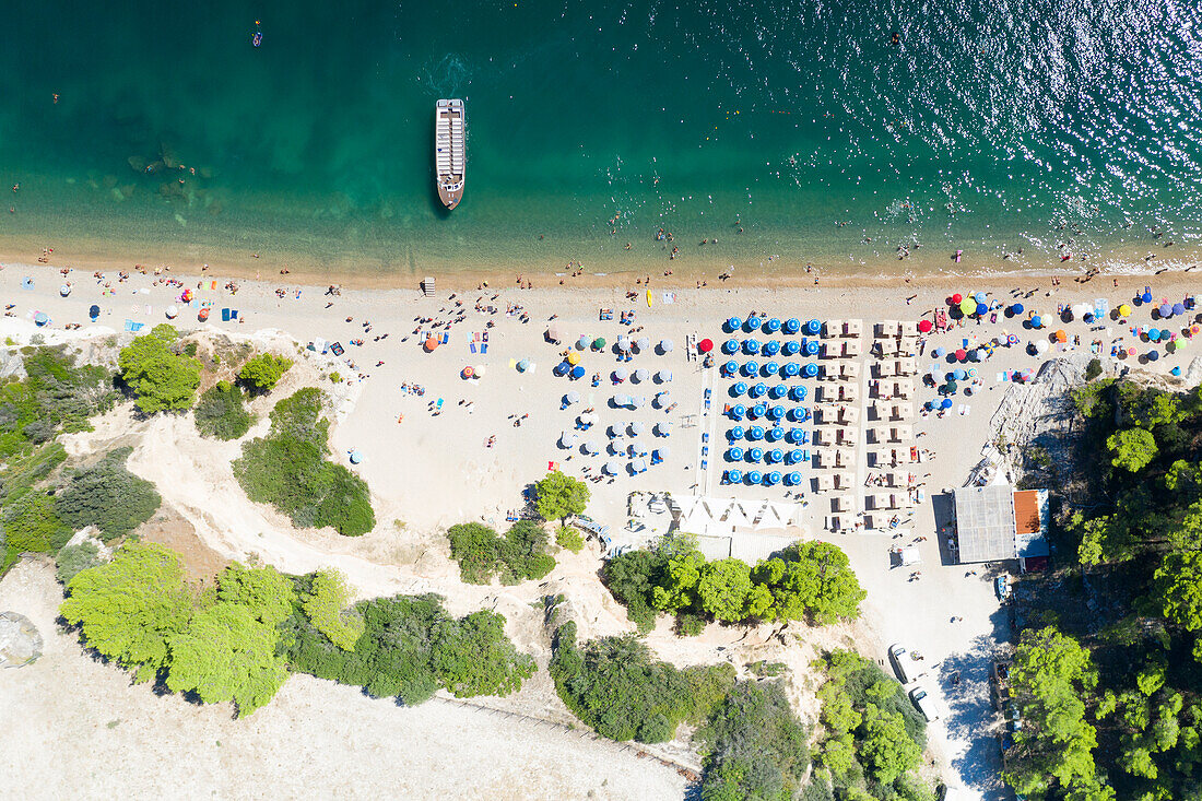 aerial view of the Gargano coast, characterized by white cliffs, caves and a crystalline sea, taken during a summer day, municipality of Vieste, Foggia province, Apulia district, Italy, Europe