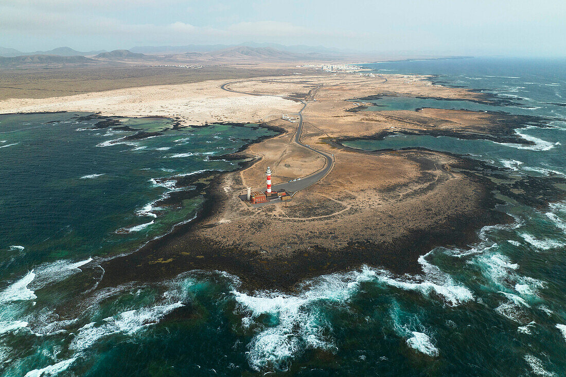 aerial view taken by drone of the Toston Lighthouse during a summer sunset, Fuerteventura, Canary Island, Spain, Europe