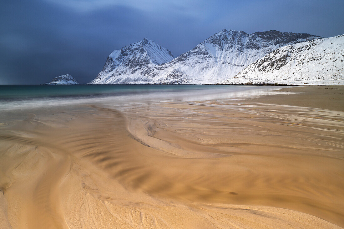 a long exposure to capture the afternoon light at Haukland beach during an winter day, Vestvagoy, Lofoten island, Norway, Europe
