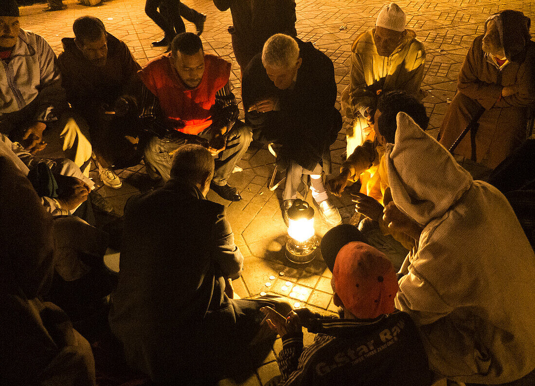 A story teller and audience in the Jamaa el Fna square of Marrakesh