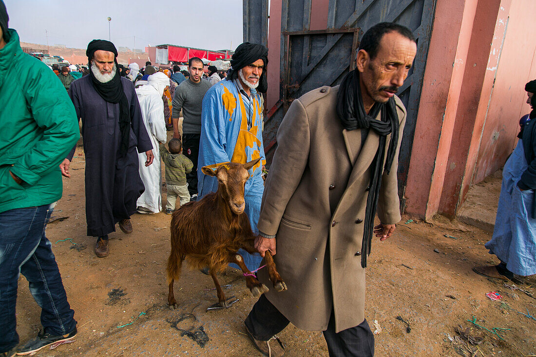 People and animals in the animal market in Guelmim