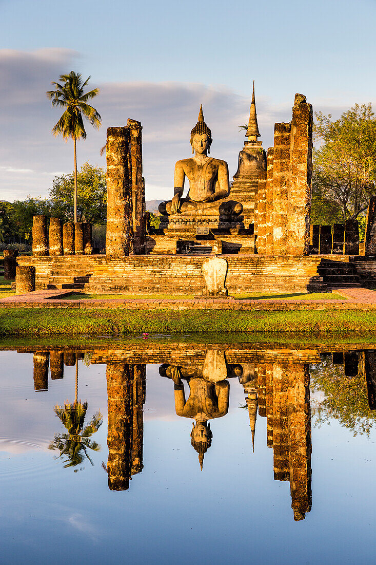 Archaeological site, ruins and Buddha statue in Sukhotai