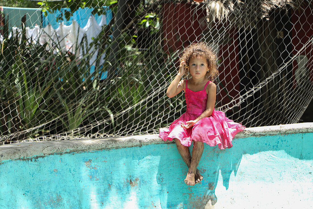 Portrait of Britany, a 4 year old girl from Jiquilillo, Nicaragua
