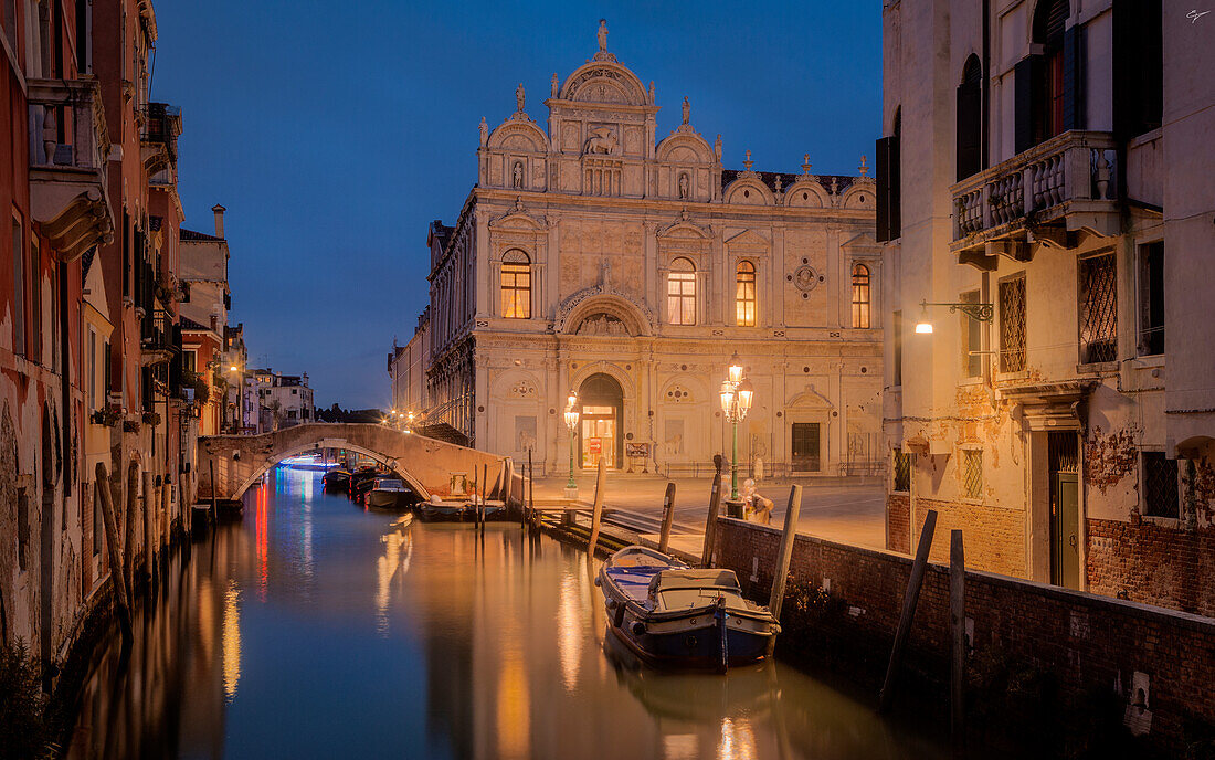 The Scuola Grande di San Marco building and Fondamenta Dandolo at night as seen from the bridge to Calle de le Erbe, Venice province, Veneto region, Italy, Europe