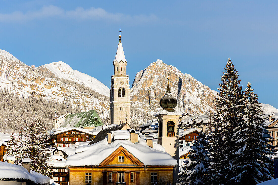 Italy,Veneto,province of Belluno,Boite Valley,the church tower of the Basilica of Cortina d'Ampezzo and in the foreground the bell tower of the church of Madonna della Difesa