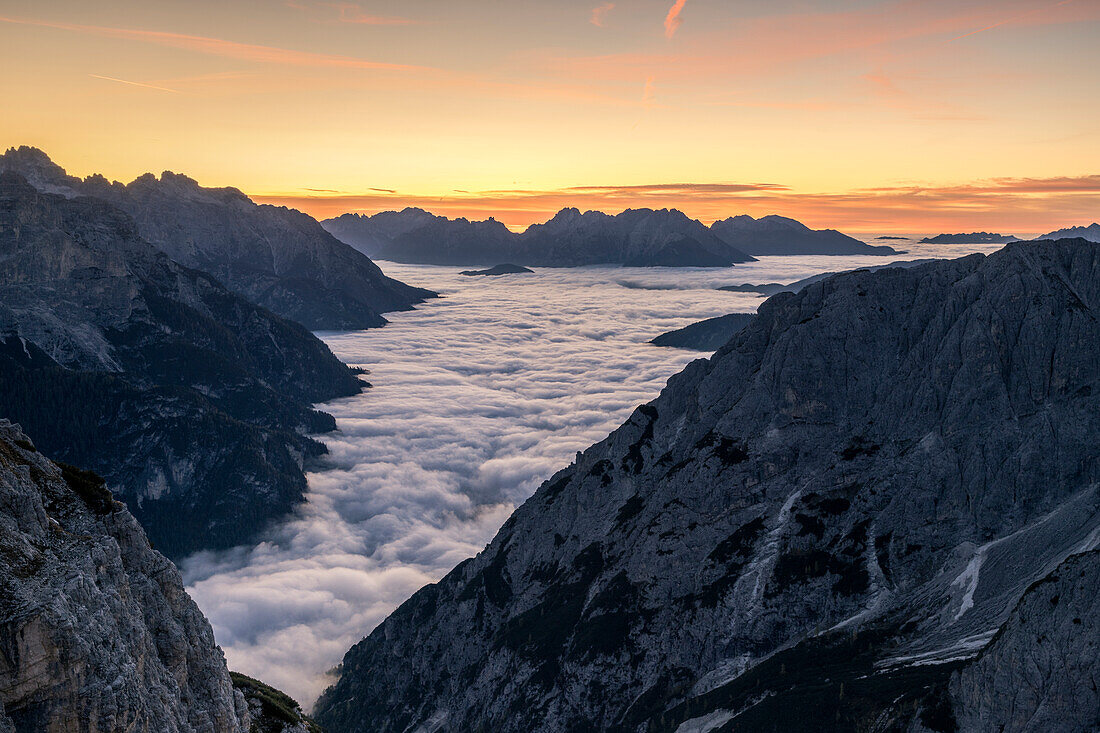 Italy,Veneto,province of Belluno,morning fog covers Auronzo di Cadore and Ansiei Valley