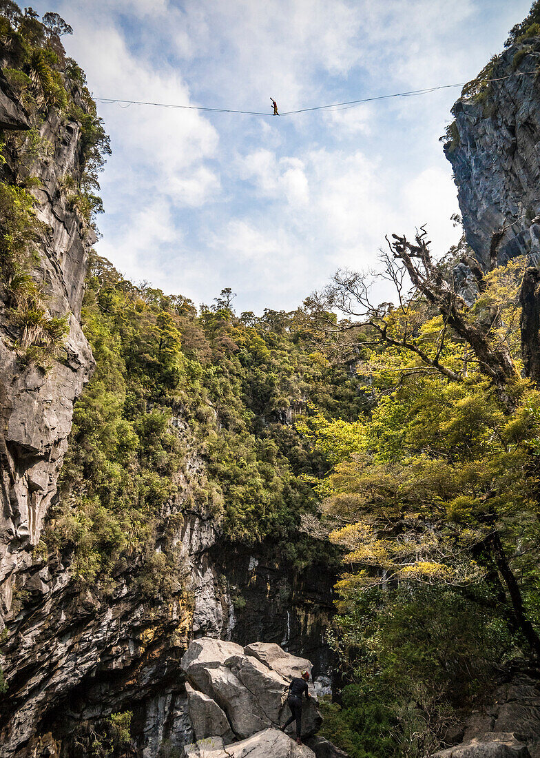 Highlining above Harwoods Hole, Golden Bay, New Zealand, Oceania