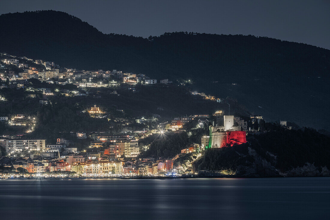 Photo with telephoto lens at night on the villages of Lerici and La Serra, castle of Lerici, municipality of Lerici, La Spezia province, Liguria district, Italy, Europe