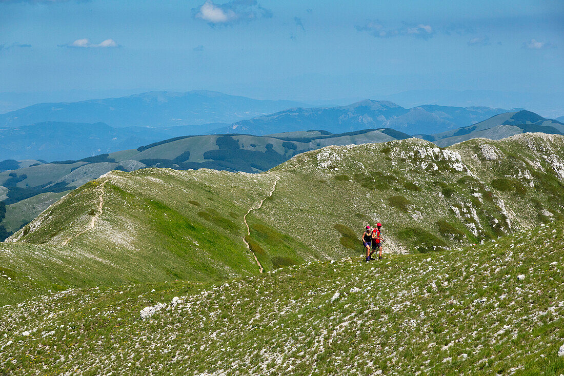 Italy, Lazio, Apennines mountain range, Hikers on Terminillo in Summer