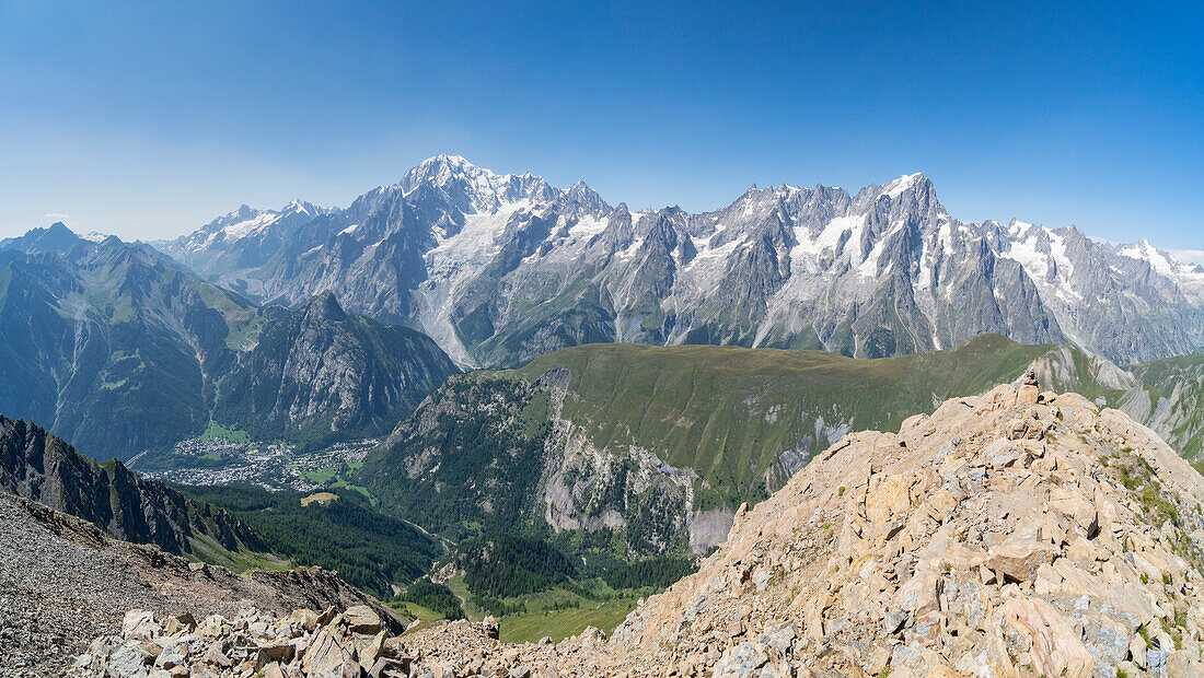 The mount Blanc group and Courmayeur town from the Tete de Licony. Bivouac Pascal, Morgex, Aosta Valley, Alps, Italy, Europe.