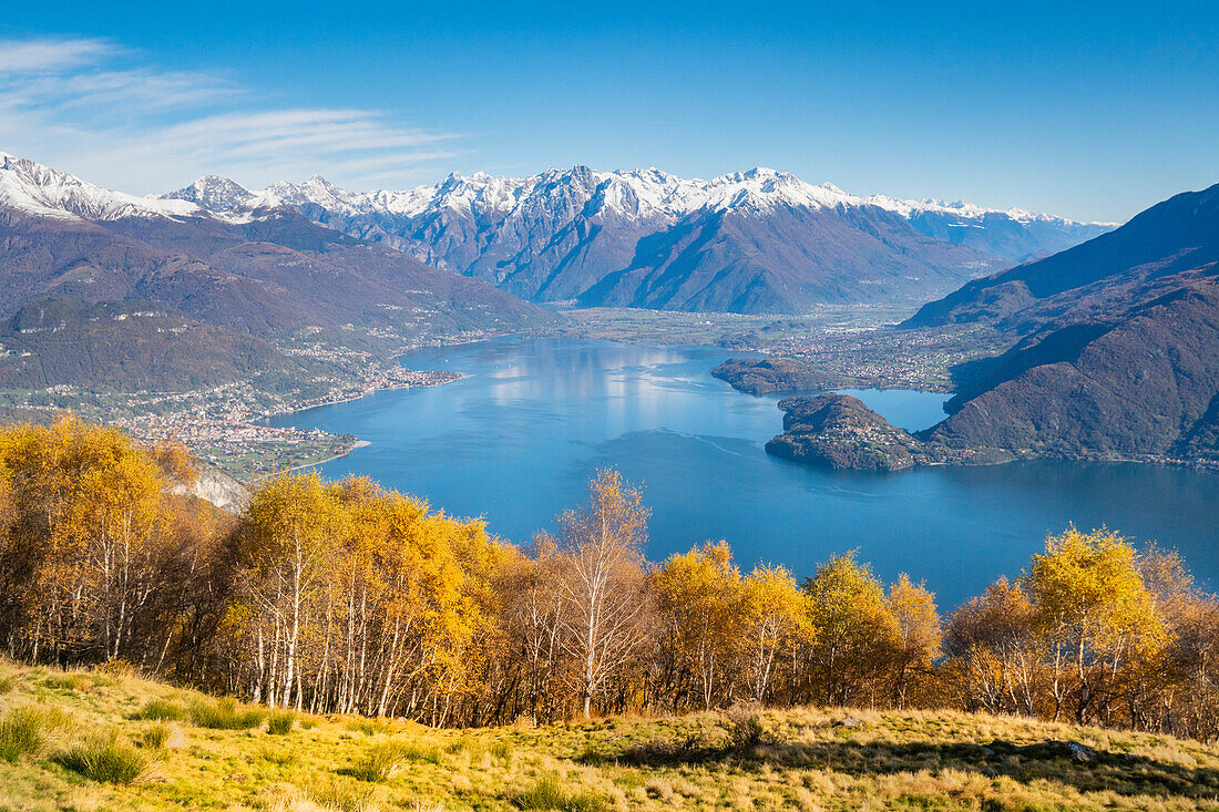 Mountain landscape from the mountains of Bregagno mount with Como lake in background during autumn. Cremia, Como district, Lombardy, Alps, Italy, Europe.