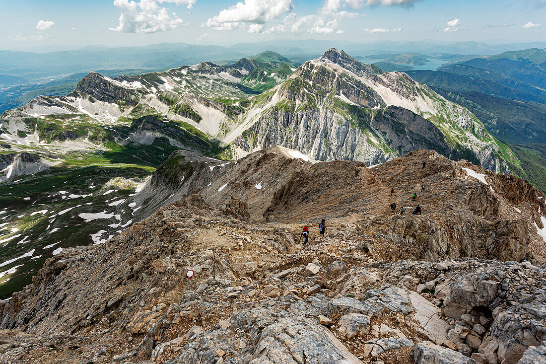 The route of the Crests on the Corno Grande. In the background the Corno Piccolo, Sella dei due corni and Prati di Tivo. Gran Sasso mountain range, Gran Sasso and Monti della Laga National Park. Abruzzo, Italy, Europe