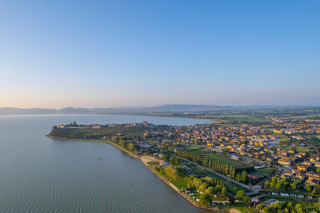 Italy, Umbria, Lake Trasimeno, Castiglione del Lago at sunrise