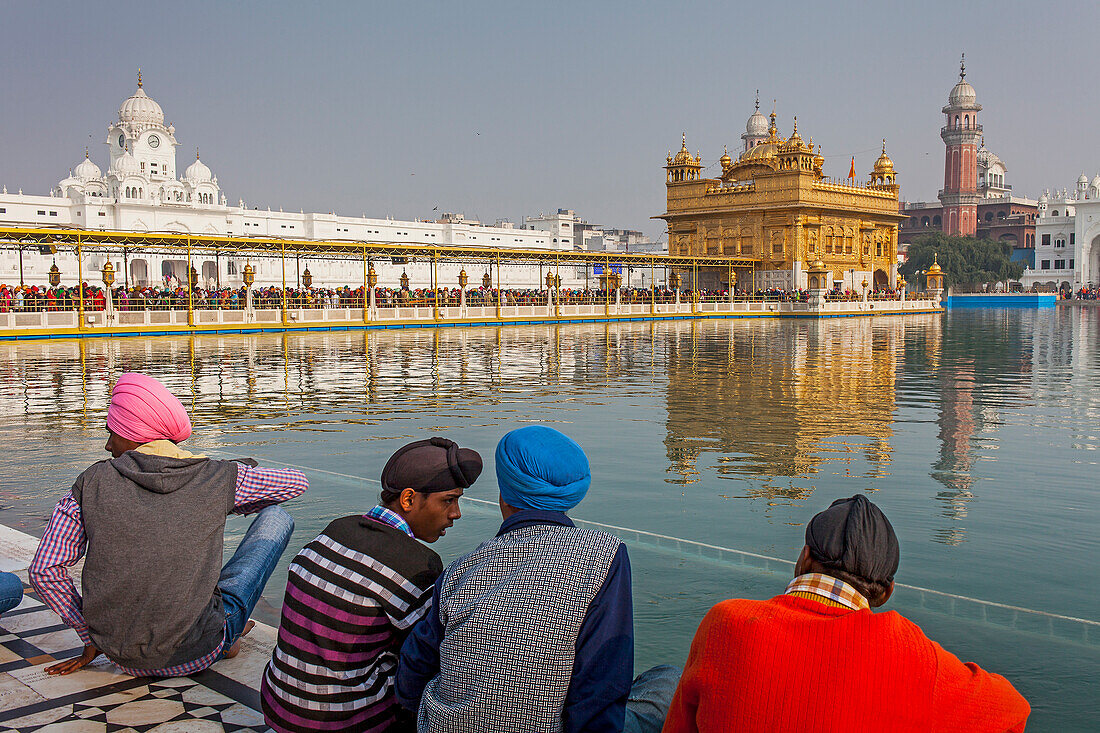 pilgrims and sacred pool Amrit Sarovar, Golden temple, Amritsar, Punjab, India