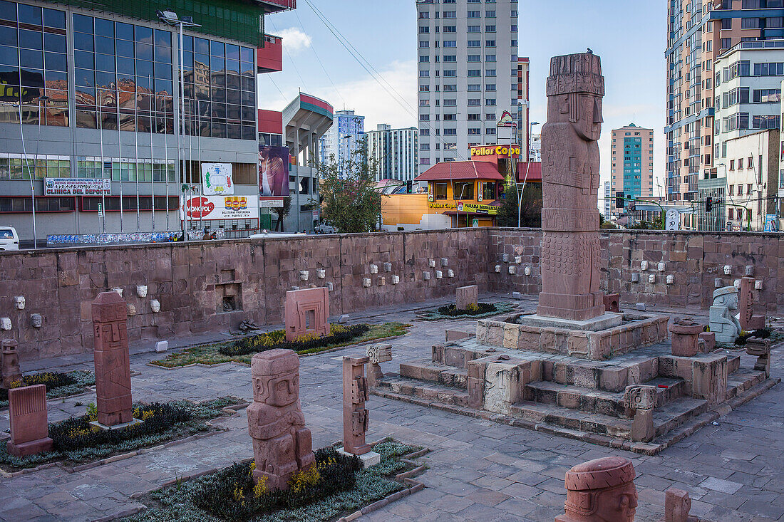 Plaza del Estadio, Tiahuanaco monolith copy in Plaza Arqueologica and Hernando Siles Olympic Stadium , La Paz , Bolivia