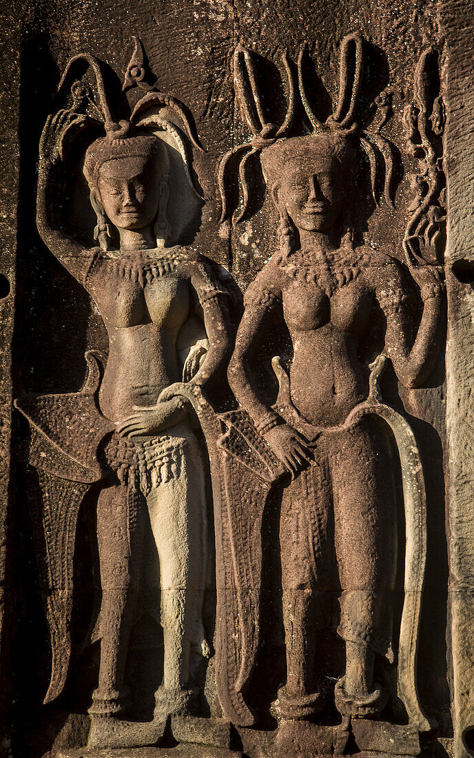 Aspara sculptures in bas-relief on the wall, in Angkor Wat, Siem Reap, Cambodia