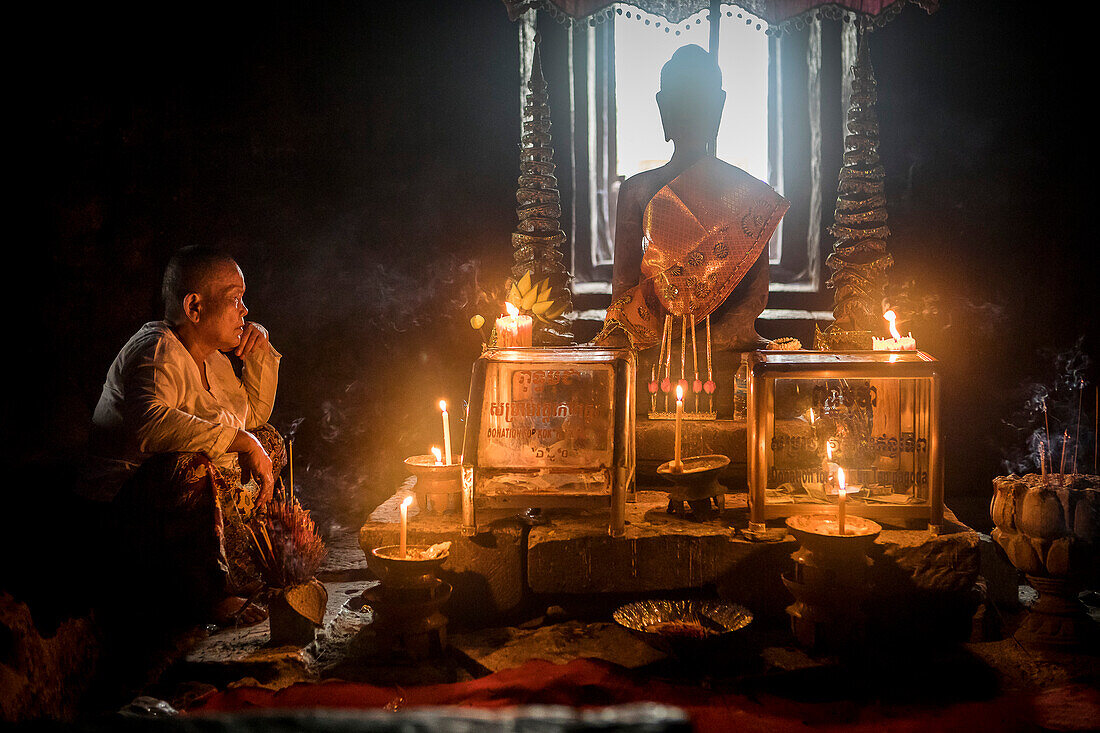 Bayon temple, Woman praying, Angkor Thom, Angkor, Siem Reap, Cambodia