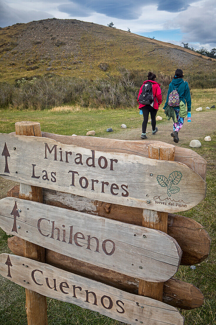 Hikers and signaling in Torres Sector, Torres del Paine national park, Patagonia, Chile