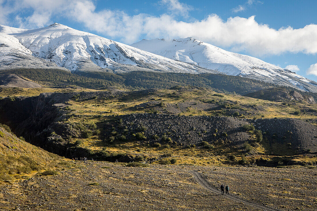 Hikers walking between Torres refuge and Cuernos refuge, Torres del Paine national park, Patagonia, Chile