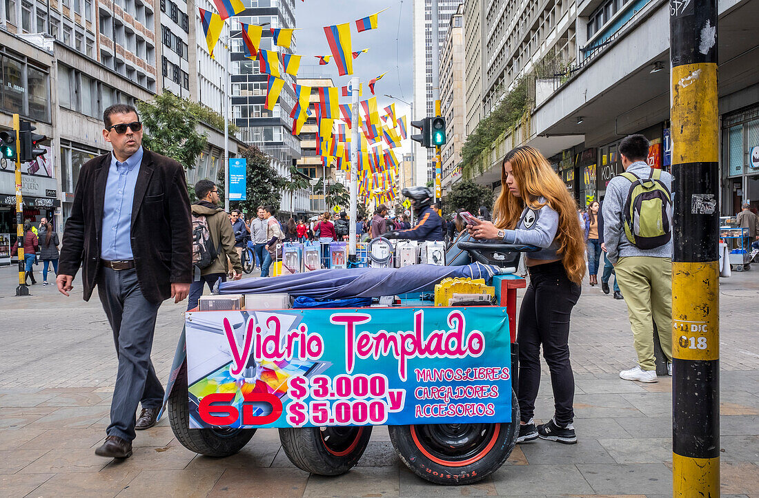 Street vendor of cell phone accessories, Carrera 7 or Carrera septima, Bogota, Colombia