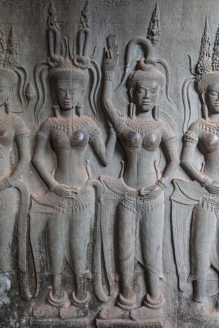 Aspara sculptures in bas-relief on the wall, in Angkor Wat, Siem Reap, Cambodia