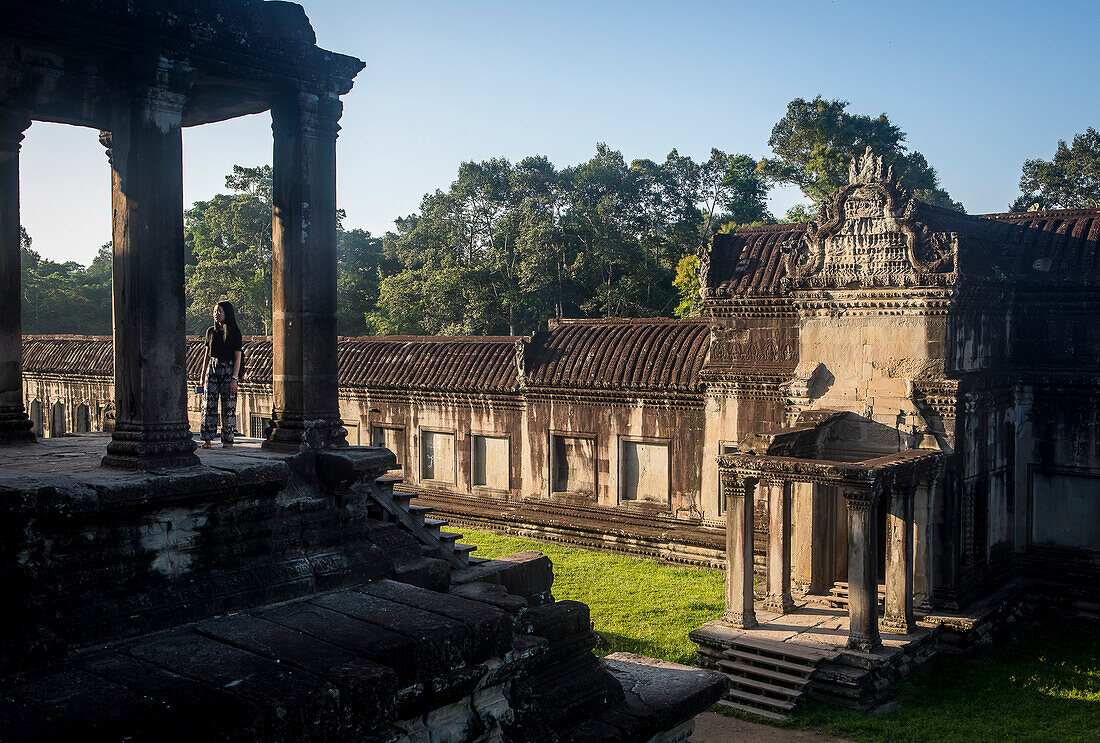 Tourist, inside Angkor Wat, Siem Reap, Cambodia