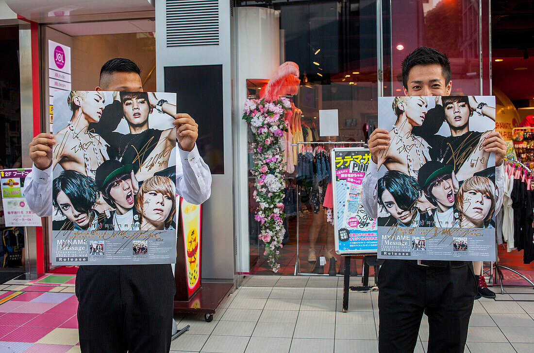 Men promoting a band, in Takeshita Dori.Tokyo city, Japan, Asia