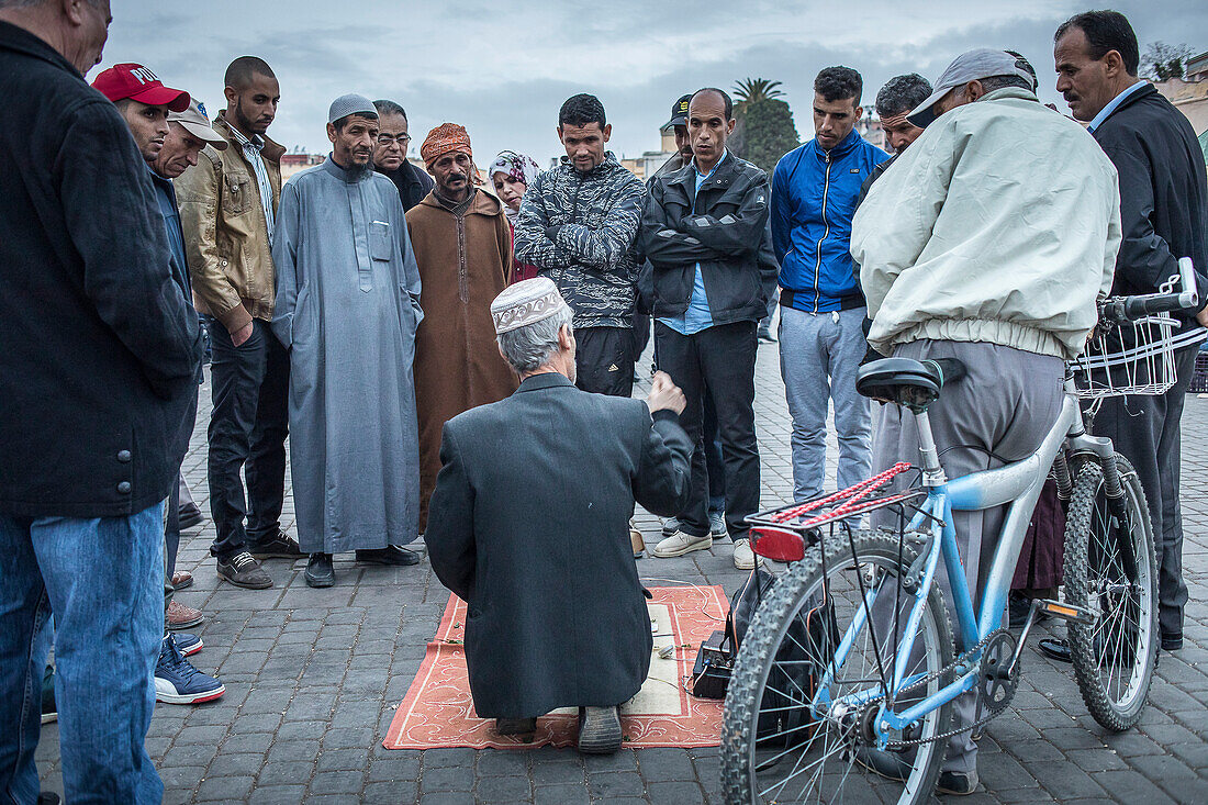 Charlatan selling potion for male impotence, El Hedim Square, Meknes, Morocco